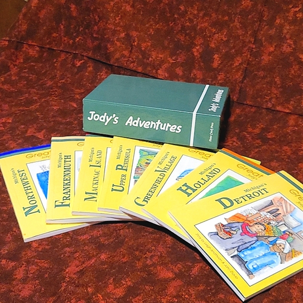 Books:  Jody's Michigan Adventures books in case box. 7 books. Great condition.